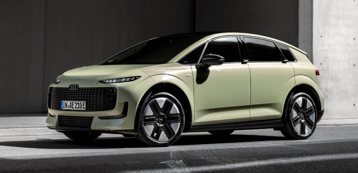 Audi A2 e-Tron amarelado visto de lado
