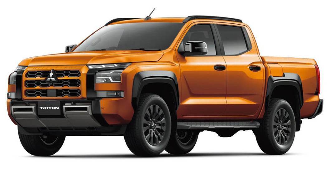 Mitsubishi Triton amarelada vista de frente