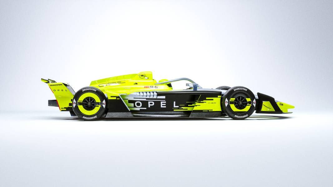 Carro de corrida Opel GSE 27FE amarelo visto de lado